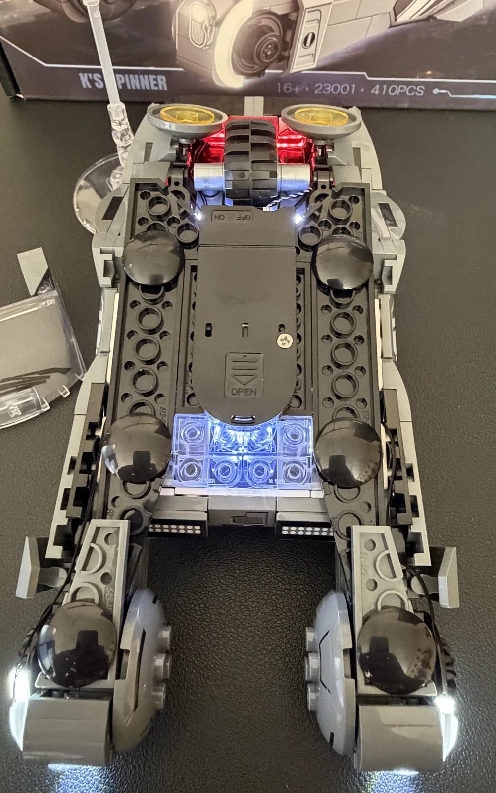 Lumibricks 23001 K's Spinner — underside showing the hidden battery box