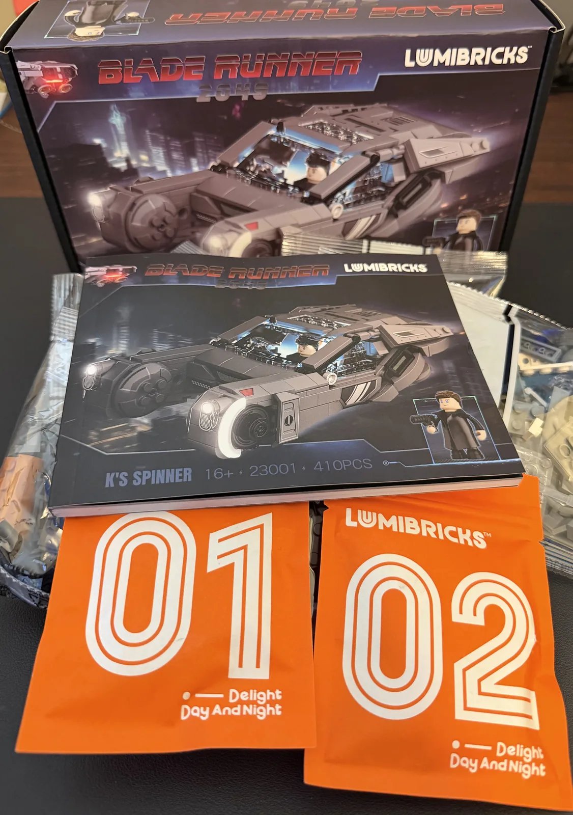 Lumibricks 23001 K's Spinner — bags, LED wiring and contents laid out