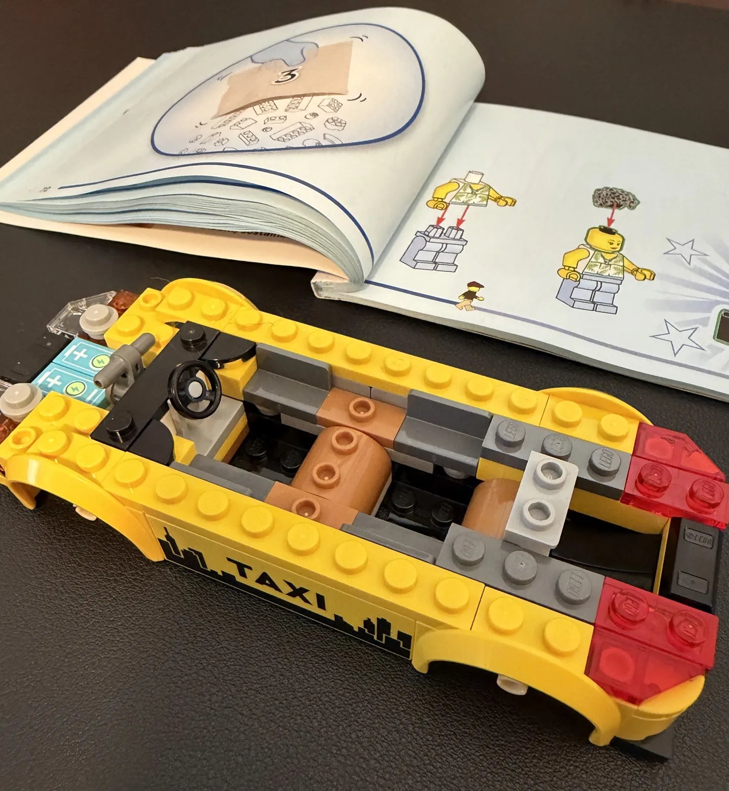 LEGO 60487 Yellow Taxi — mid build chassis