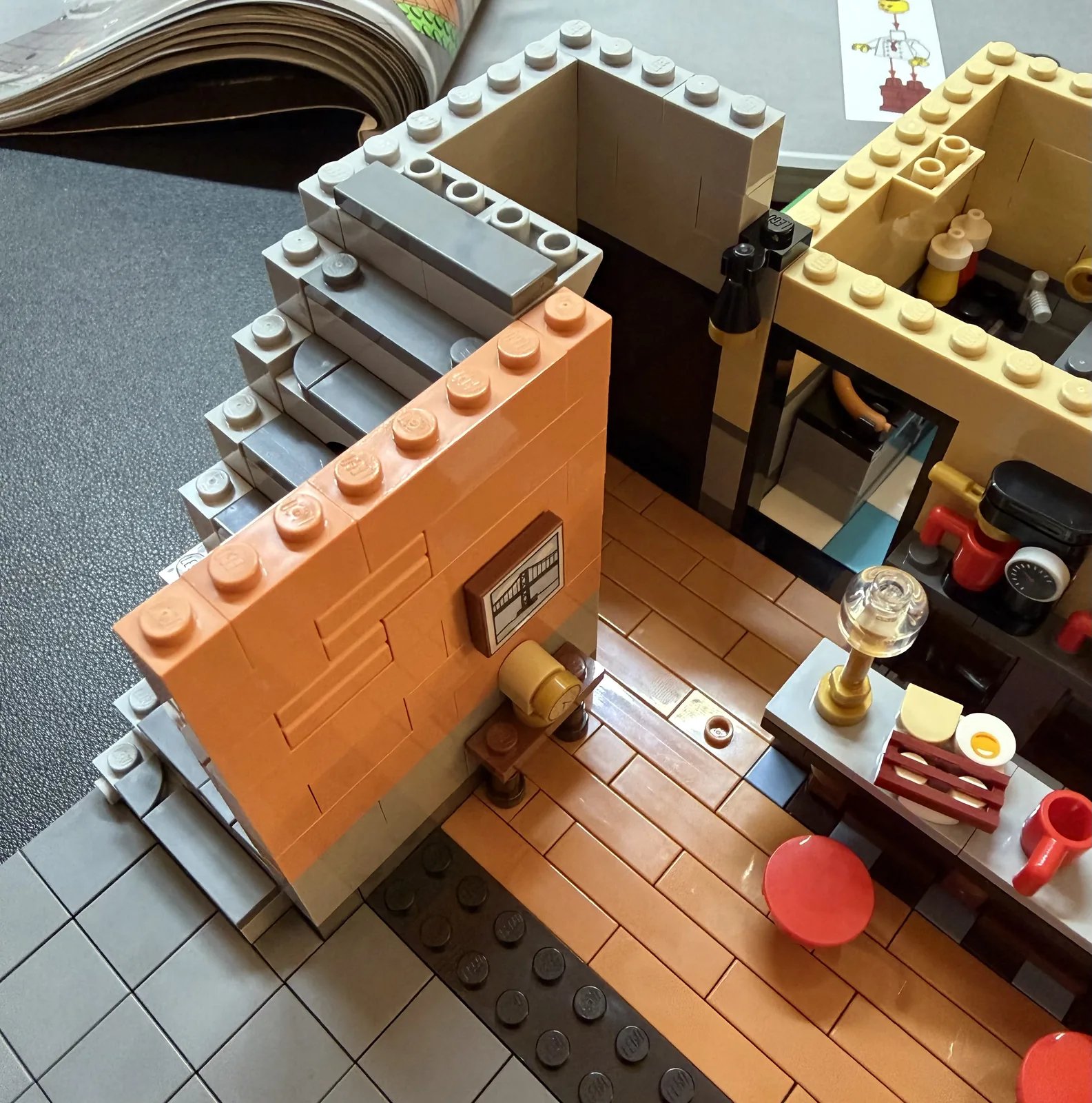 LEGO 10350 Tudor Corner — first floor in progress, walls going up