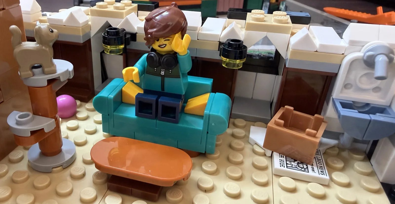 LEGO 10350 Tudor Corner — attic tenant on the couch