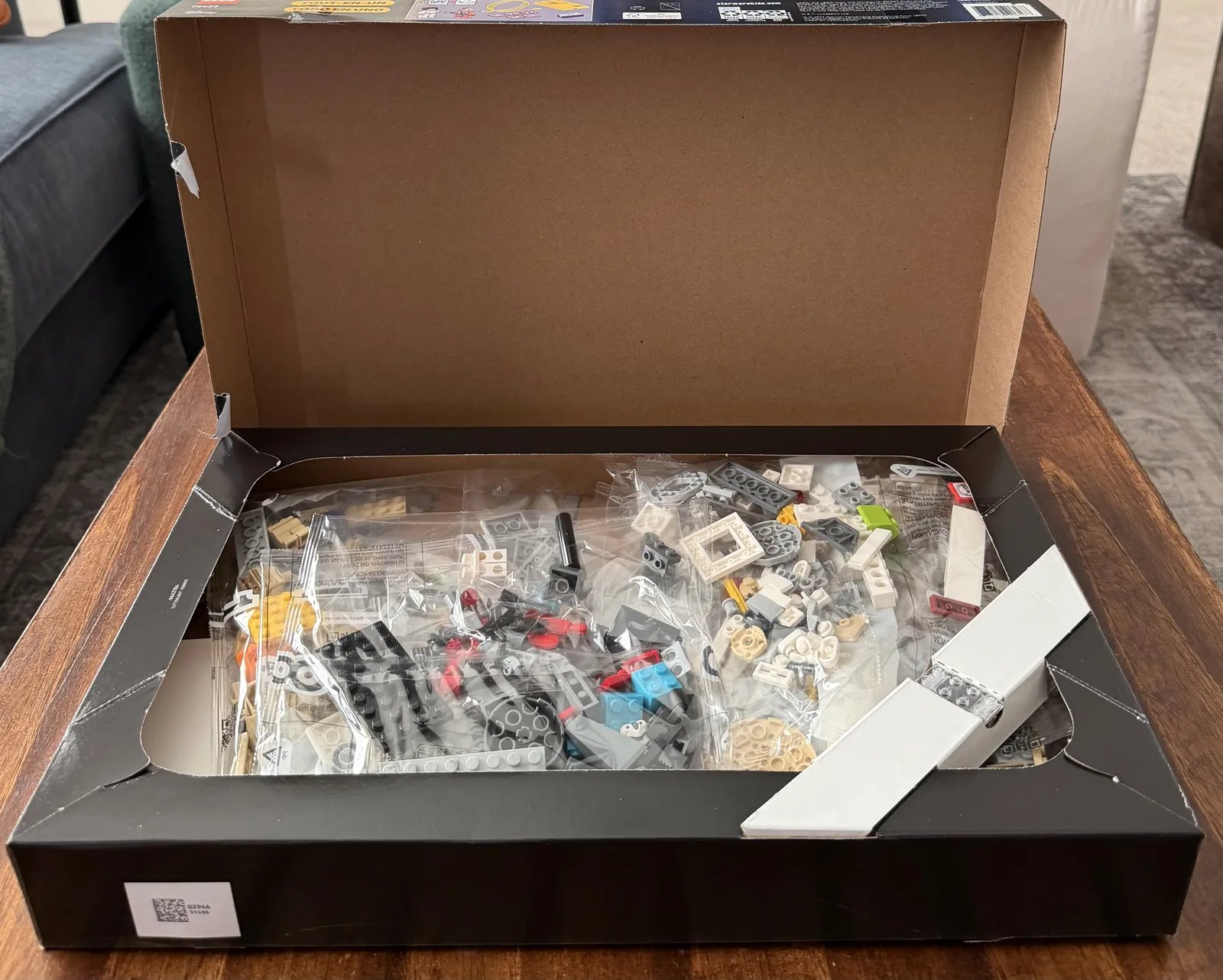 LEGO 75423 X-Wing box opened, showing the inner trays