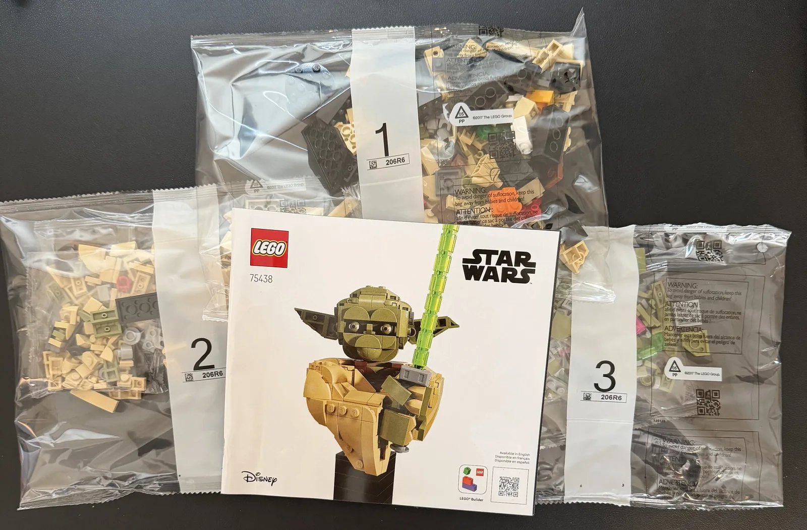 LEGO 75438 Star Wars Yoda Bust — box contents with numbered bags and instructions
