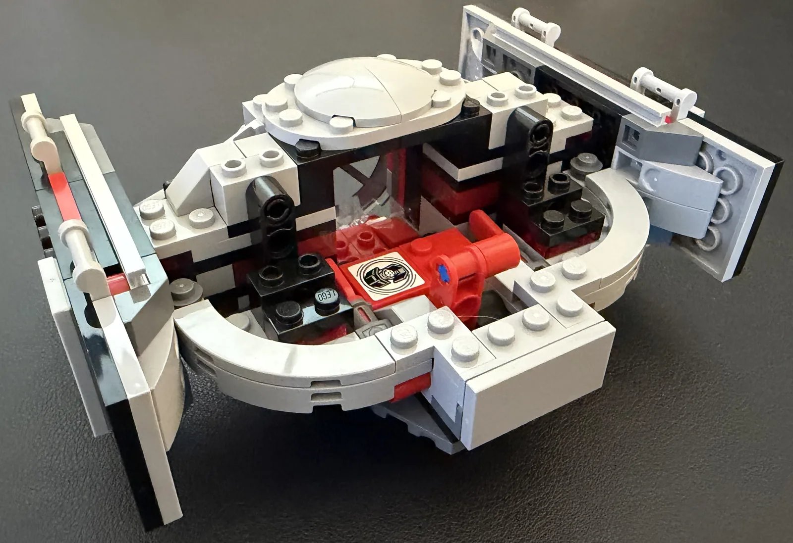 LEGO 75421 Darth Vader's TIE Fighter — red cockpit interior with the printed SMART Tag tile and trigger mechanism