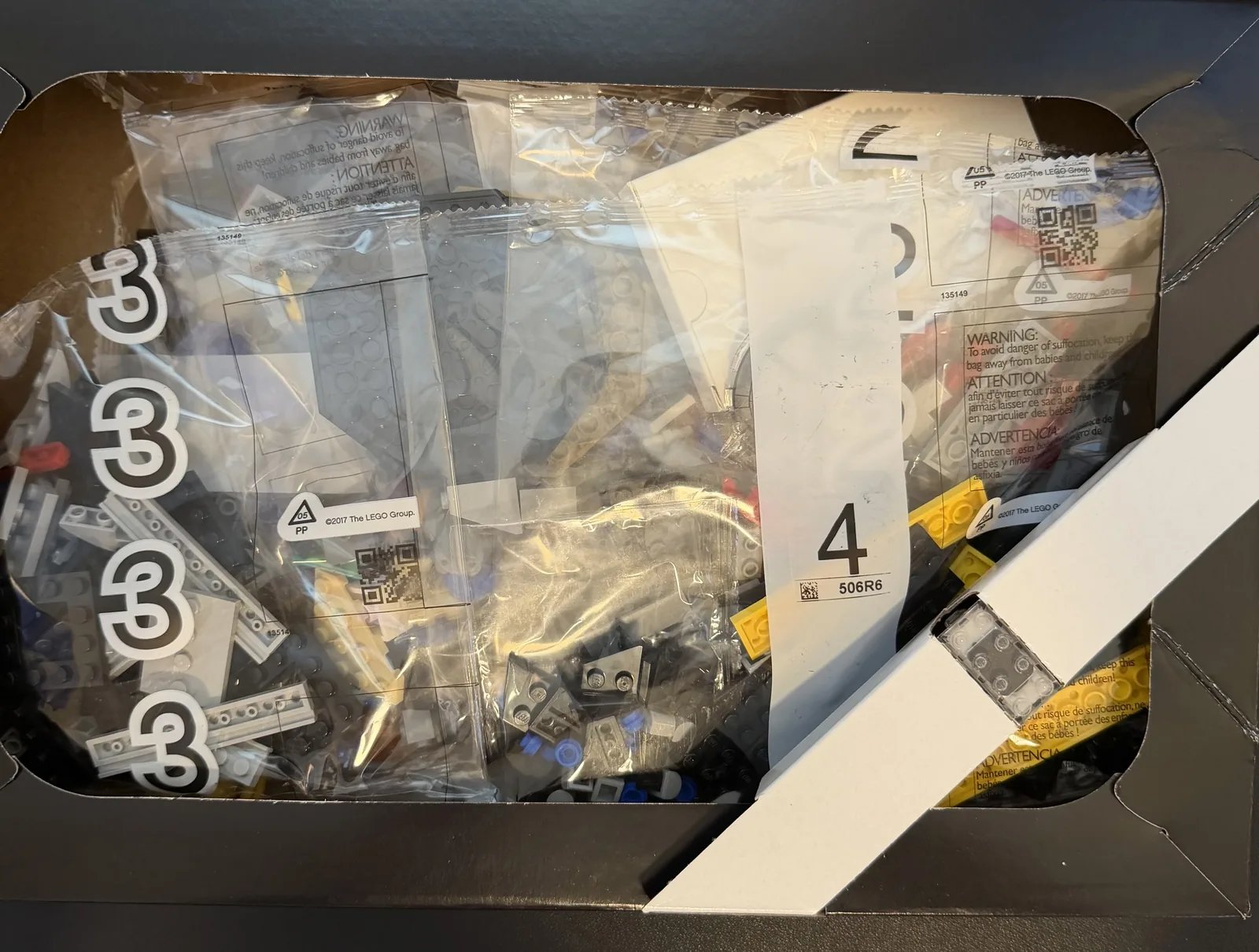 LEGO 75421 Darth Vader's TIE Fighter — numbered parts bags inside the box