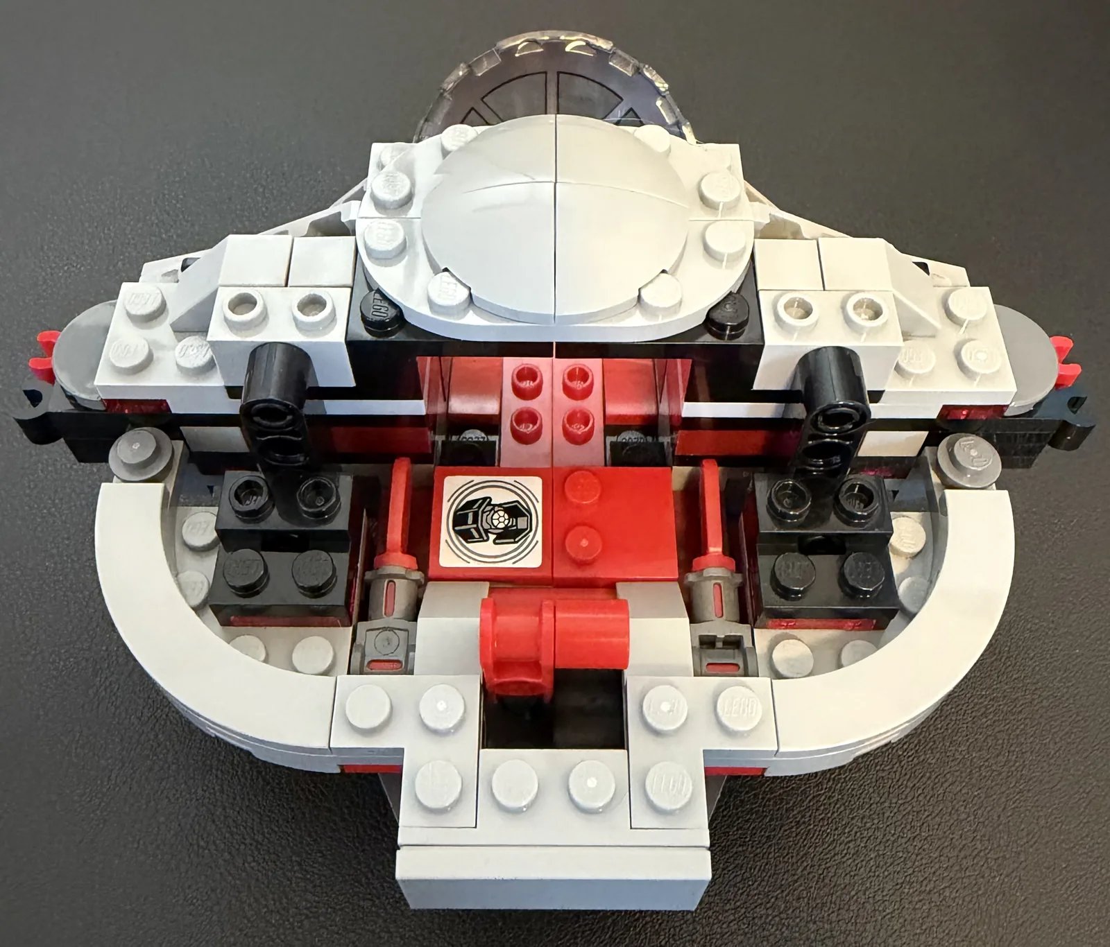 LEGO 75421 Darth Vader's TIE Fighter — build step 4, the round hull ring