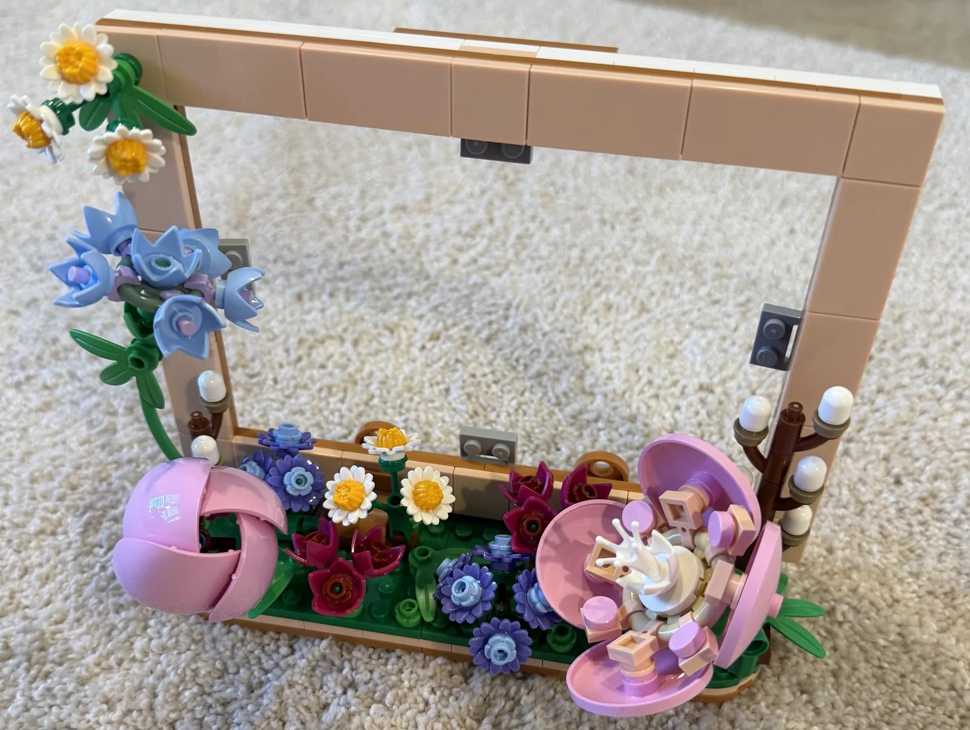 LEGO 40916 Floral Picture Frame — completed and framing a photo