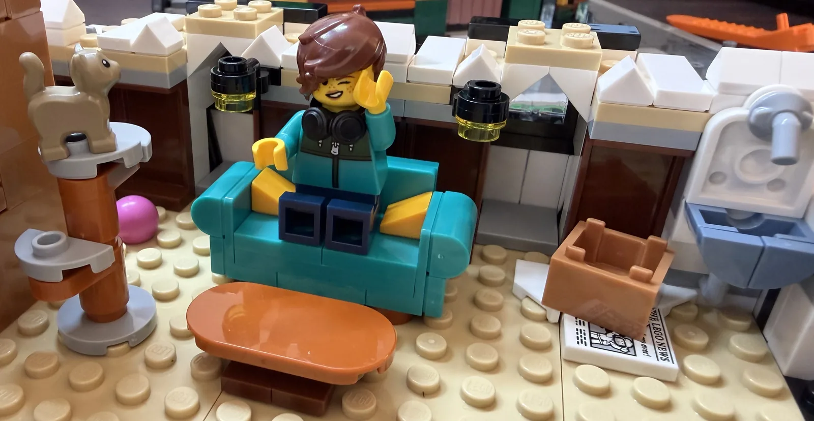 LEGO 10350 Tudor Corner — attic tenant on the couch
